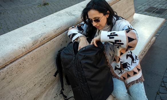 Tortuga Travel Backpack Pro in a city