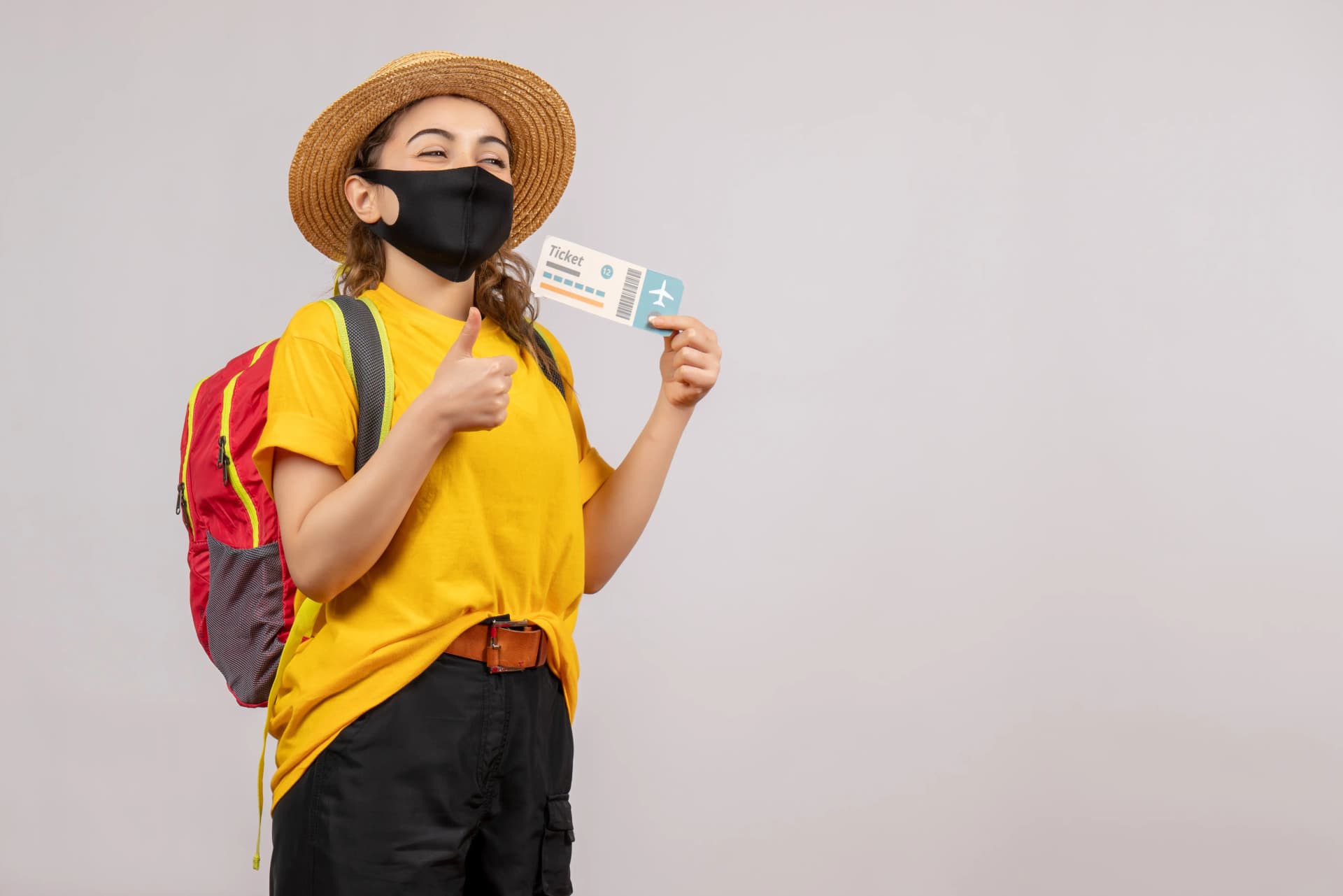 A family checking in at an American Airlines counter, symbolizing the card's travel perks.