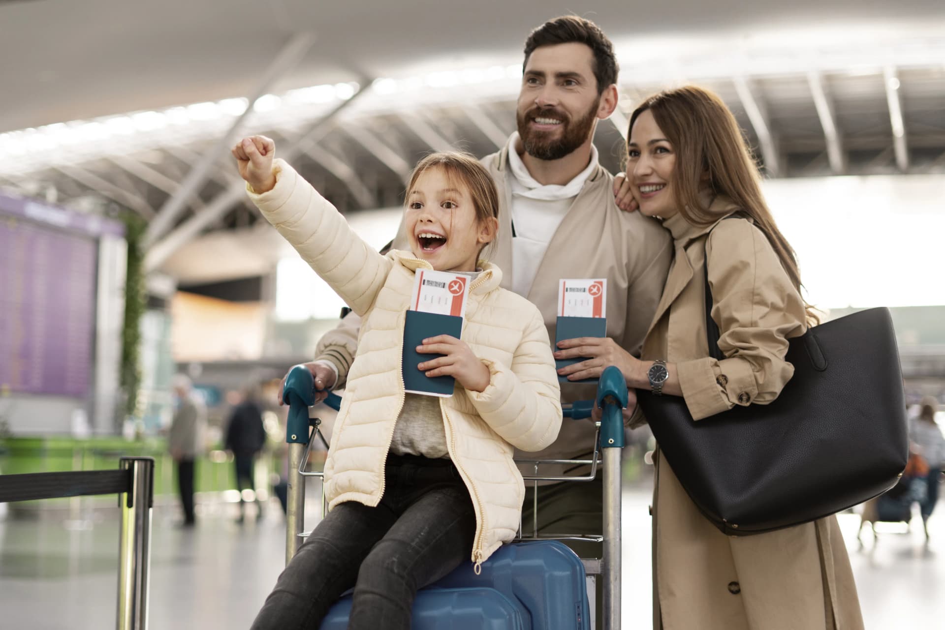 A family checking in at an American Airlines counter, symbolizing the card's travel perks.