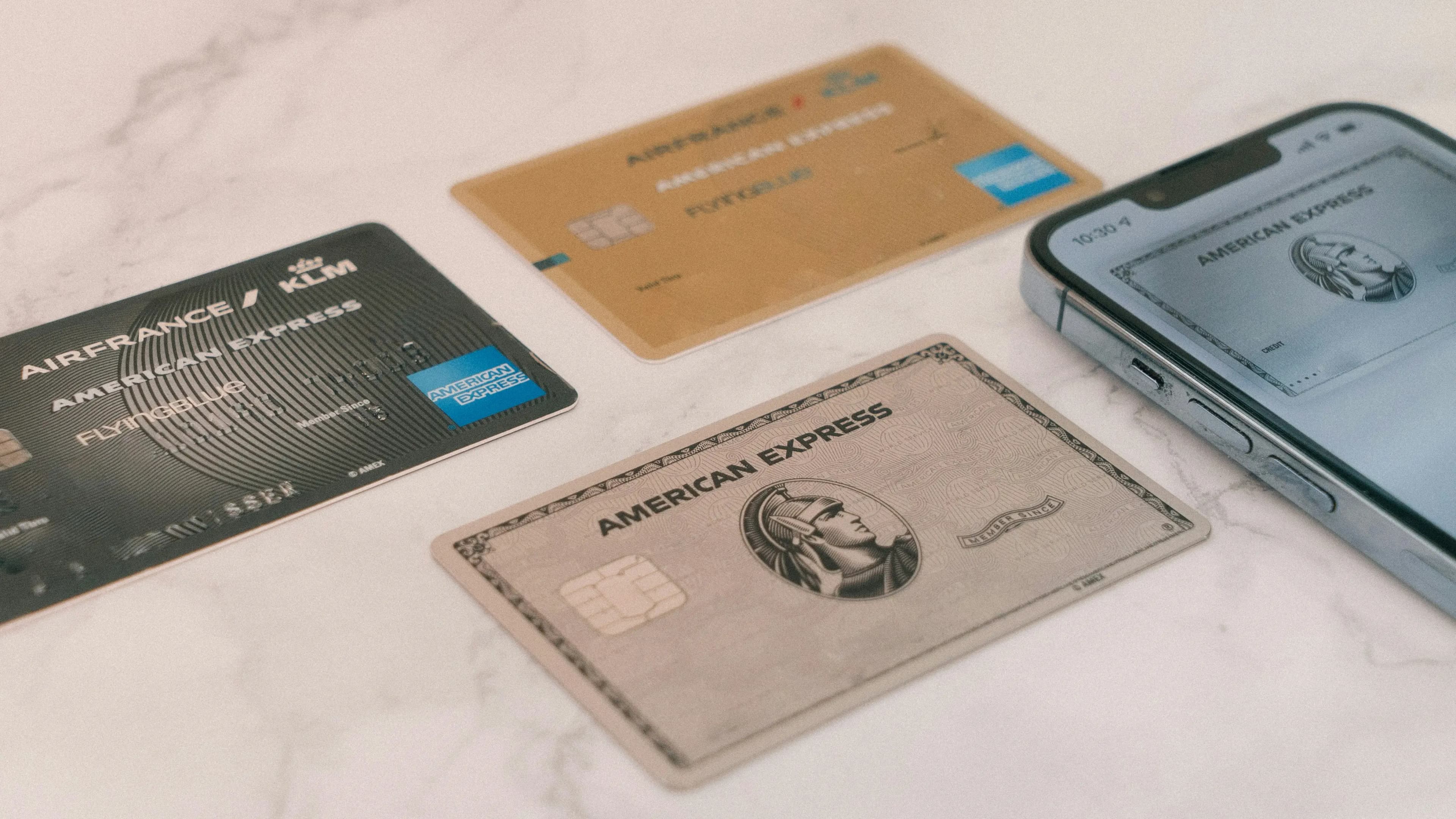 Stylized image of Amex Gold card alongside other complementary credit cards, symbolizing strategic pairing.